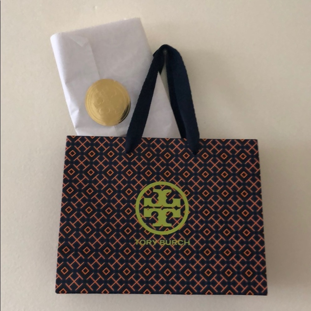 Tory Burch shopping bag with new Tory tissue paper